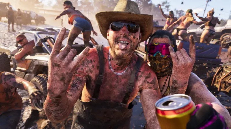 Mud-covered partygoers at a mud-bogging event