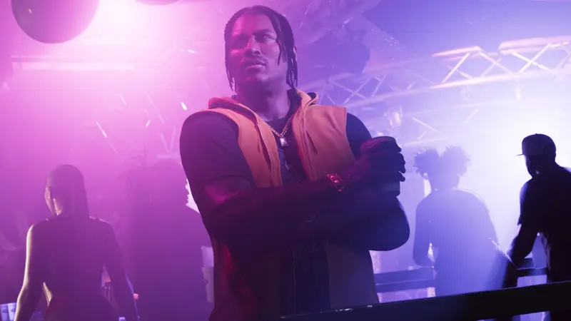 Dre'Quan Priest in a purple-lit club