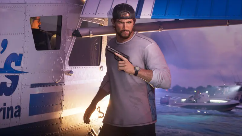 Jason Duval holds a pistol beside the water at dusk