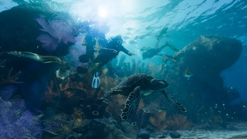 Divers swim with a sea turtle over a coral reef