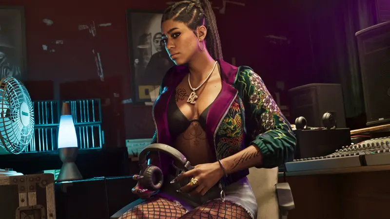 A member of Real Dimez in a home studio with headphones