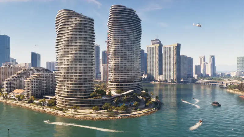 Curved twin towers on the bay, boats in the water