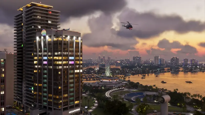 A downtown Vice City tower at dusk with a helicopter, official GTA 6 screenshot